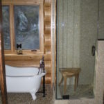 glass shower pebble floor