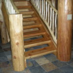 5-29-2009 half log stairway, log railing