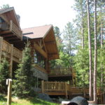 Cedar log home decks log railing