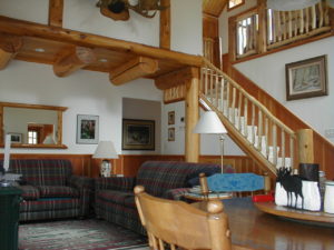 Looking up at the loft area from living room