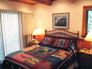 bedroom with drywall doug fir cedar logs