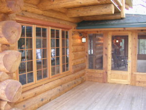 Cedar Logs, deck and screen porch