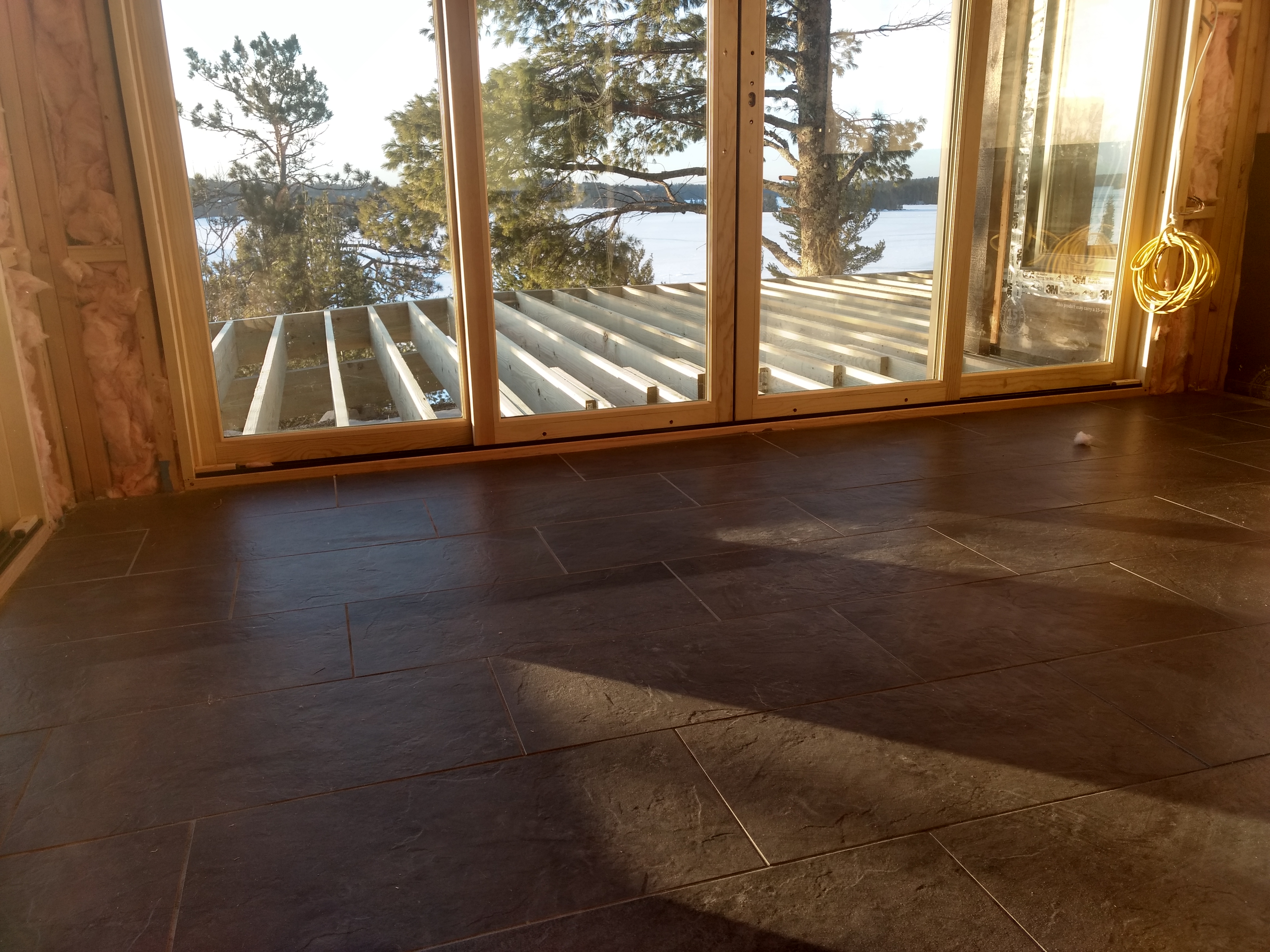 Sunroom tile and deck framing