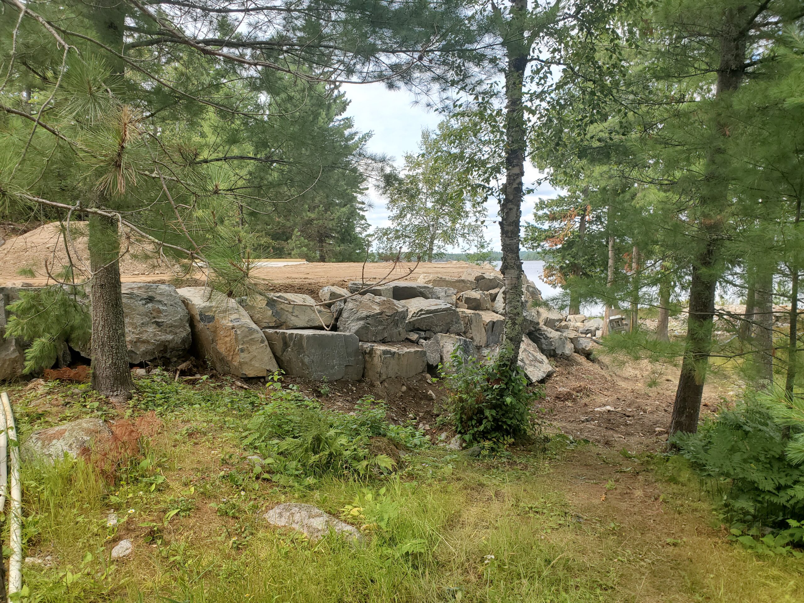 Retaining wall boulders, custom home by Huisman Concepts, Ely MN Retaining wall boulders, custom home by Huisman Concepts, Ely MN