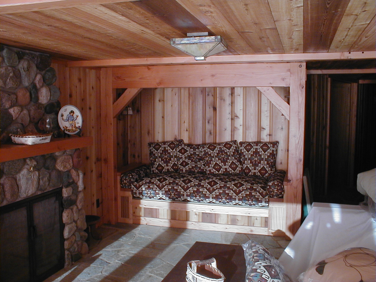 Doug fir beams, cedar paneling and stone fireplace