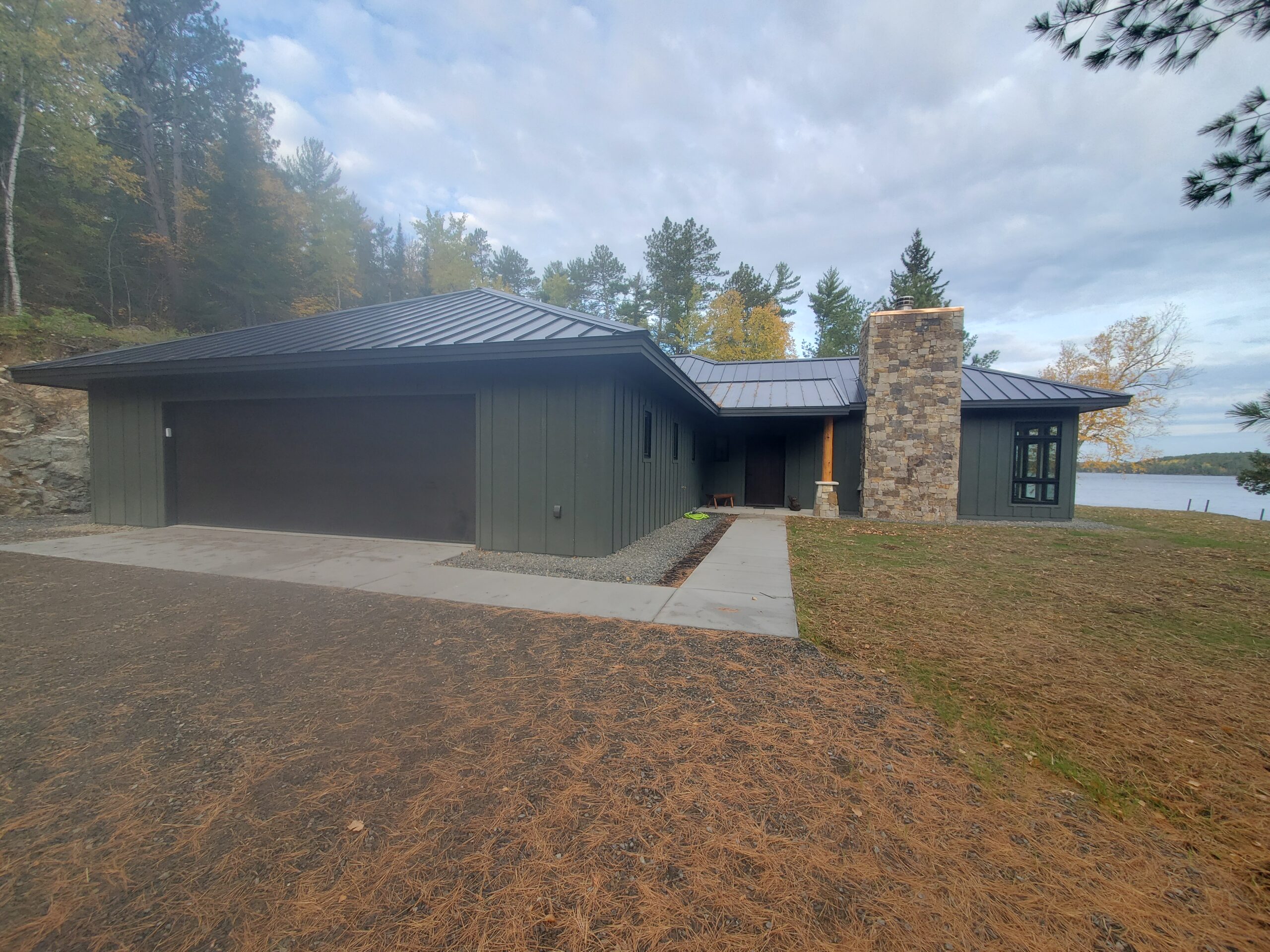 Garage entry, lake home by Huisman Concepts