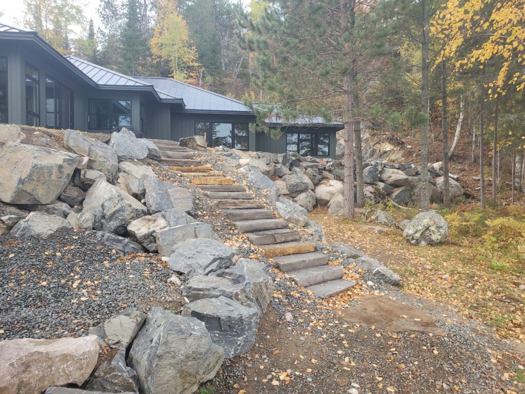 Stone steps up to ely lake home from lake